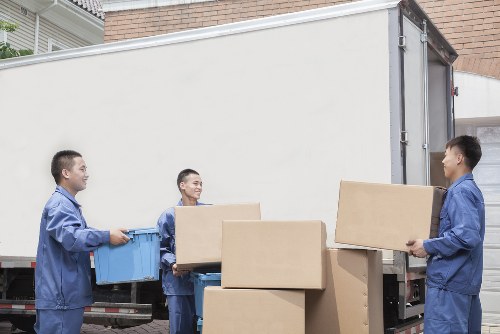 Professional movers managing access at a Chislehurst property