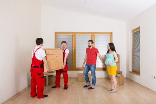 Packed moving boxes and furniture for a local relocation