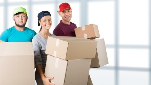 Furniture and household items being loaded for transport in Chislehurst