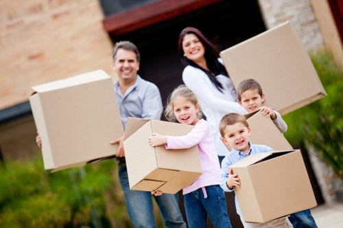 Removal team working on a Chislehurst home move with boxes and furniture
