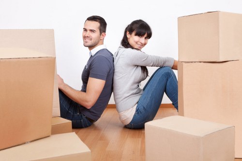 Careful loading of household items into a moving van