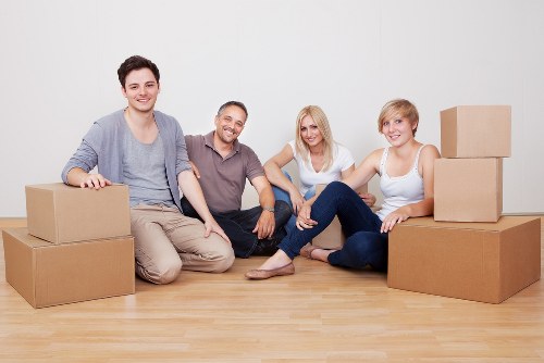 Furniture and boxes being transported by a local man with van service