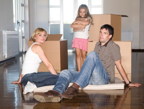 Careful loading of large furniture items for collection